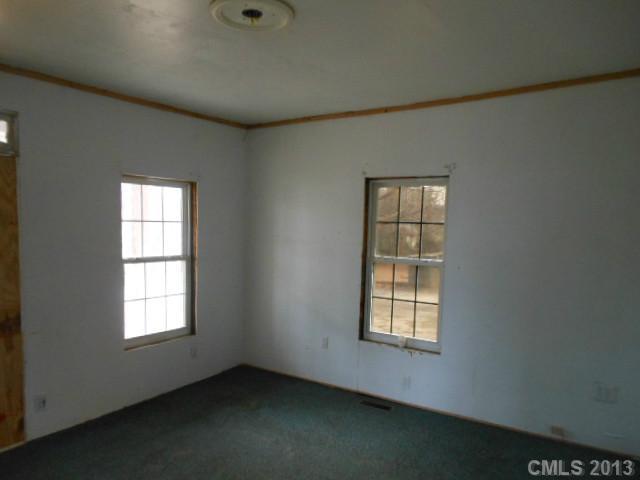 914 Ki Pope Road Belmont, NC 28012 - Photo 5 of 8 an empty room with a window