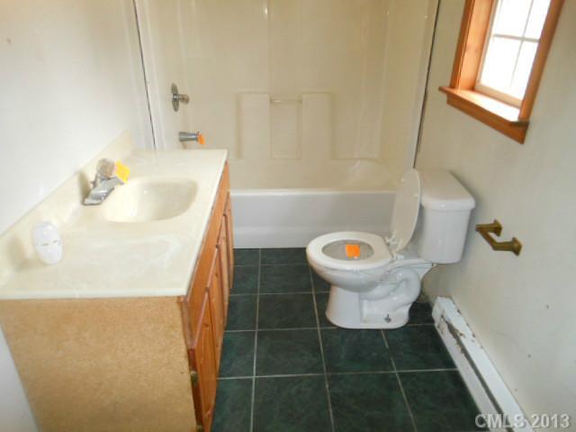 914 Ki Pope Road Belmont, NC 28012 - Photo 6 of 8 a bathroom with a sink and toilet