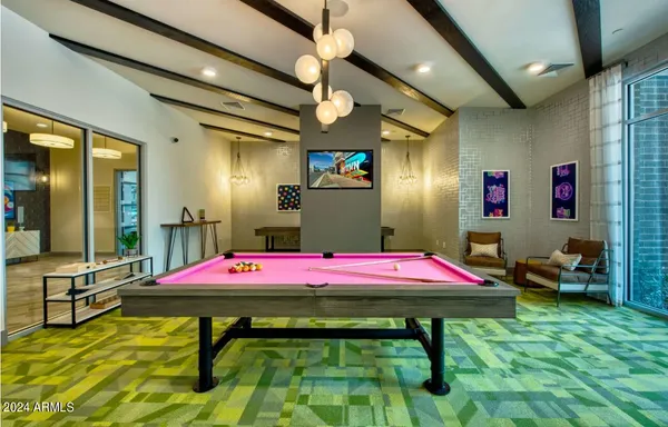 a patio with table and chairs
