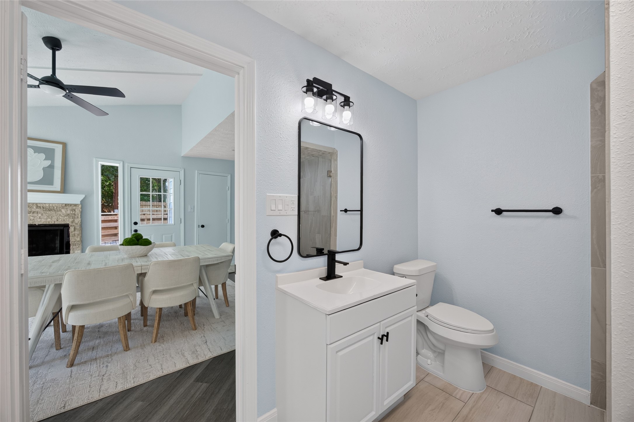 8002 Lichen Lane Spring, TX 77379 - Photo 20 of 50 The utility room and full bathroom are located off the dining room.