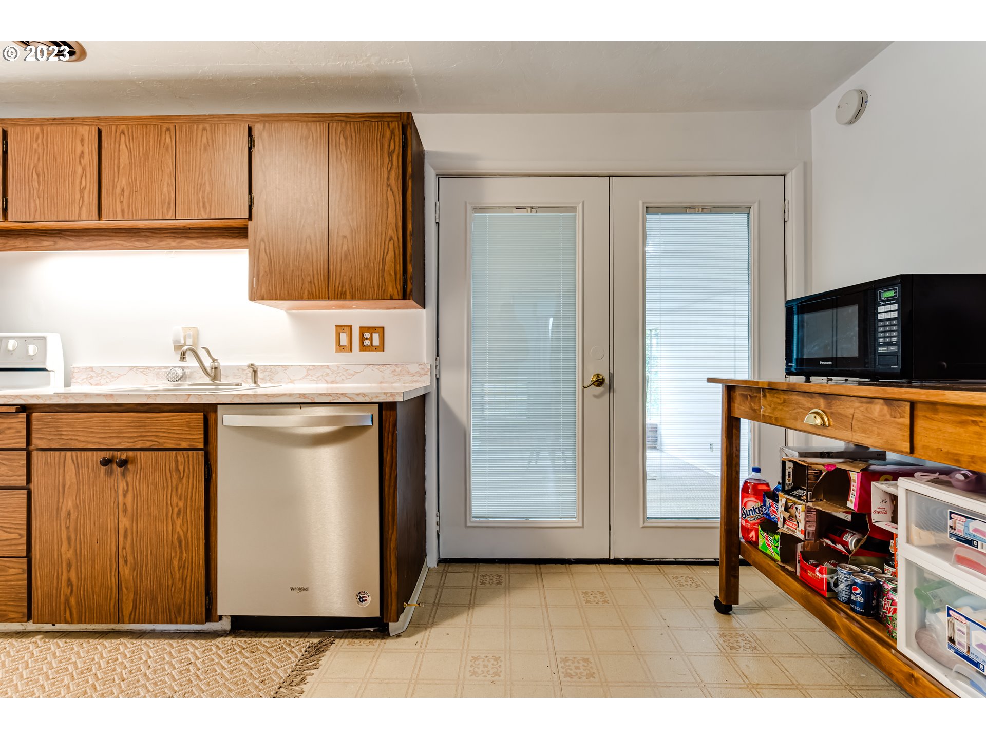 959 Laurelhurst Drive Eugene, OR 97402 - Photo 14 of 30 a kitchen with stainless steel appliances cabinets and a window