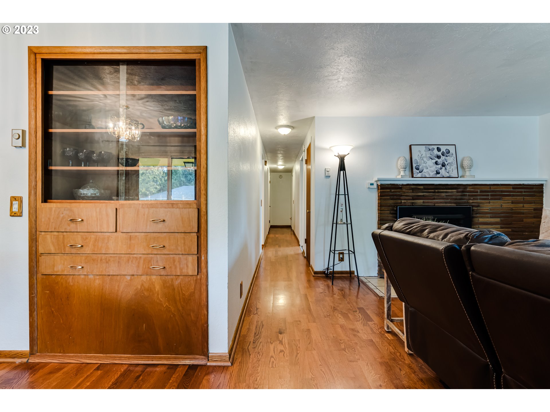 959 Laurelhurst Drive Eugene, OR 97402 - Photo 10 of 30 a living room with furniture and a fireplace