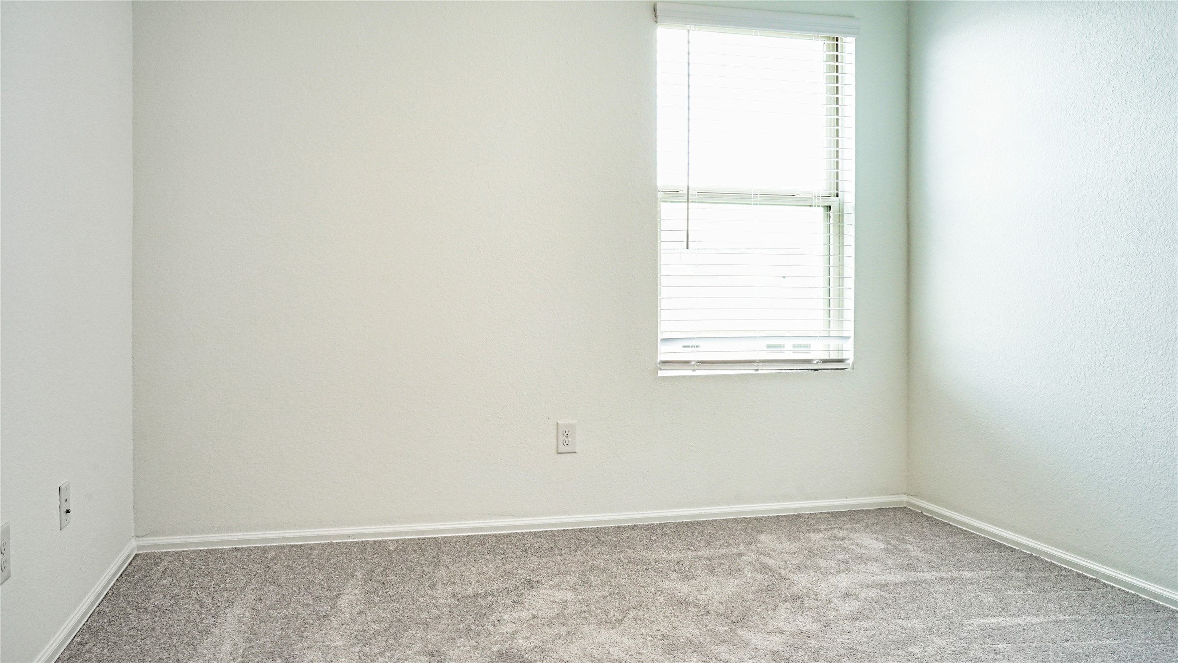 3358 Avary River Lane Rosenberg, TX 77471 - Photo 19 of 22 an empty room with a window