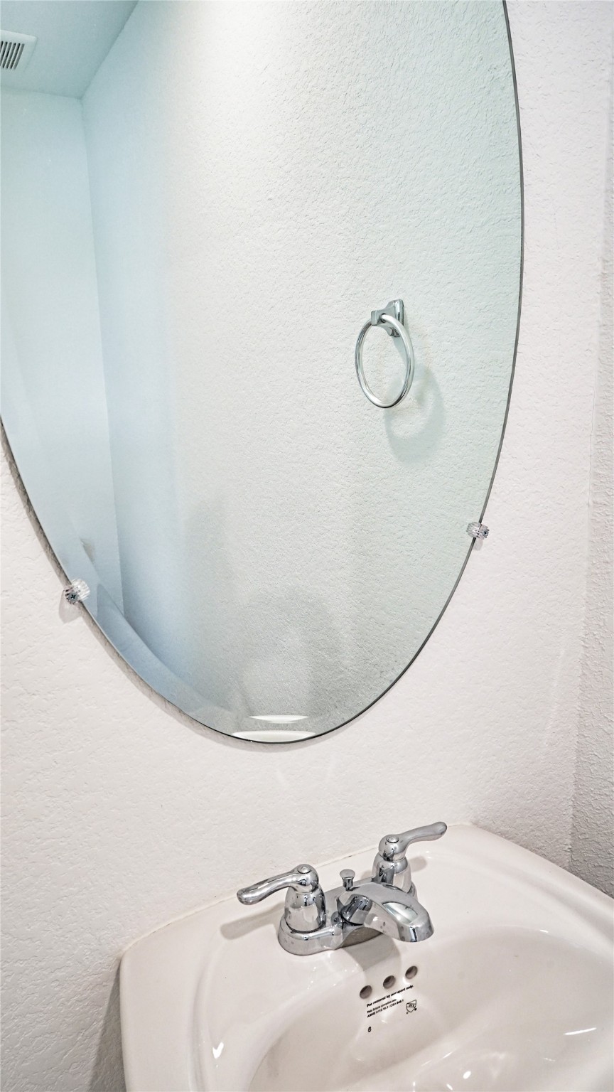 3358 Avary River Lane Rosenberg, TX 77471 - Photo 3 of 22 a bathroom with a sink and mirror