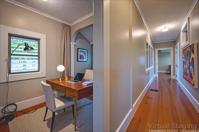 a workspace with furniture and window