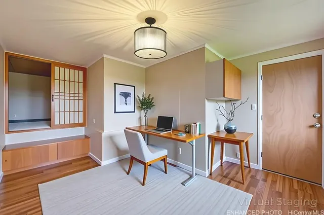 a view of a livingroom with furniture and window