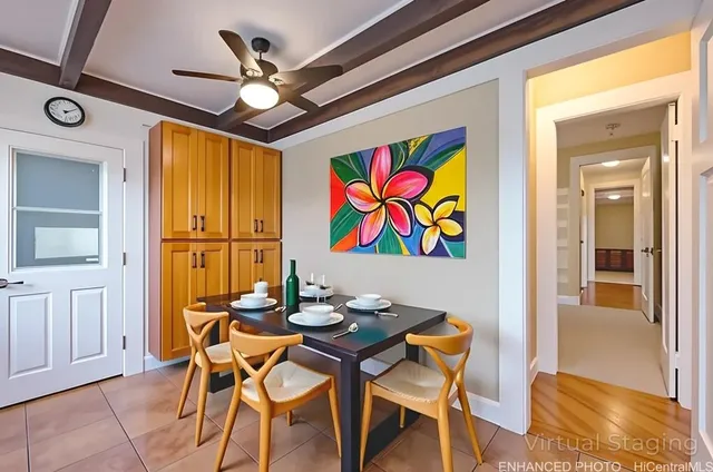 a dining room with furniture and window