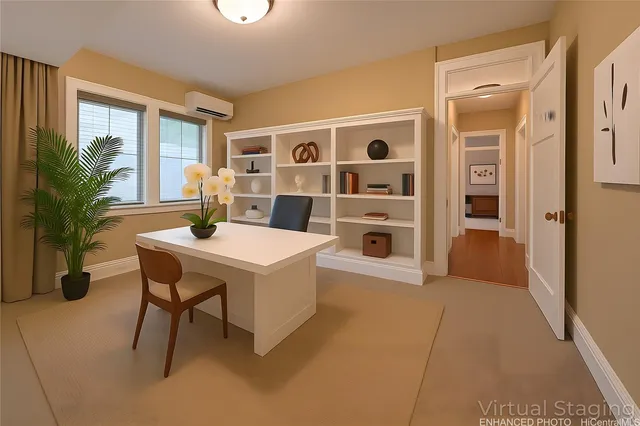 a view of a livingroom with furniture and window