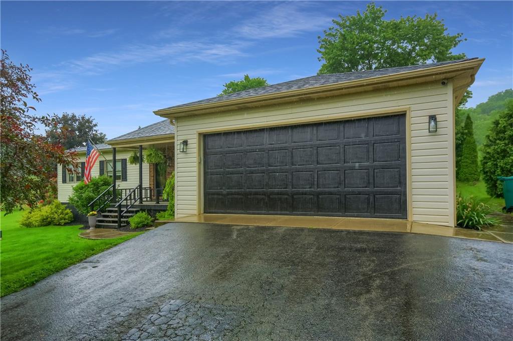2971 Acre Road New Castle, PA 16101 - Photo 3 of 31 a view of a house with a yard and garage