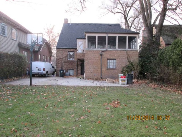 315 Selborne Road Riverside, IL 60546 - Photo 2 of 22 a front view of a house with a garden