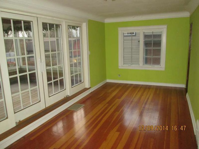 315 Selborne Road Riverside, IL 60546 - Photo 11 of 22 a view of a room with wooden floor and windows