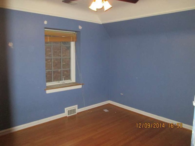 315 Selborne Road Riverside, IL 60546 - Photo 14 of 22 an empty room with a window