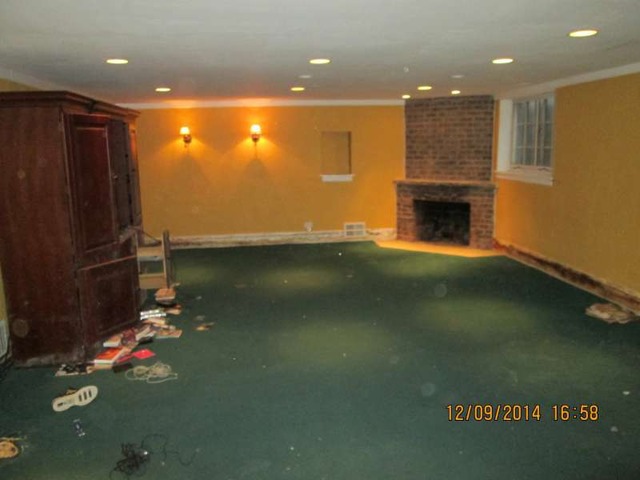 315 Selborne Road Riverside, IL 60546 - Photo 18 of 22 a view of an empty room with a fireplace