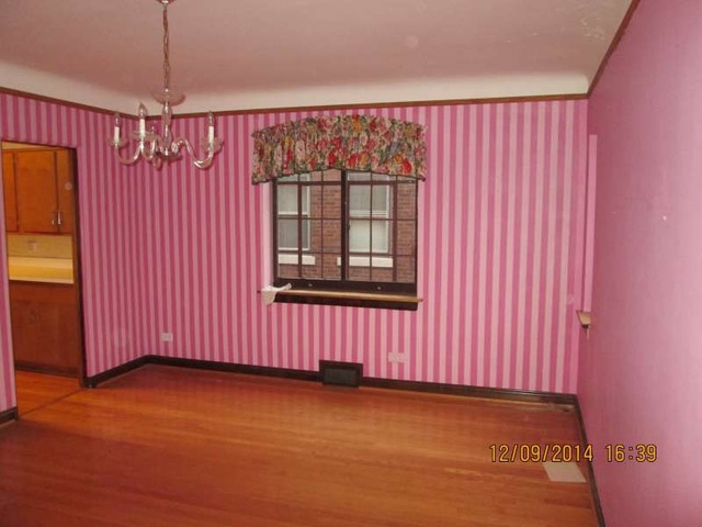 315 Selborne Road Riverside, IL 60546 - Photo 5 of 22 a view of a livingroom with an empty space and window