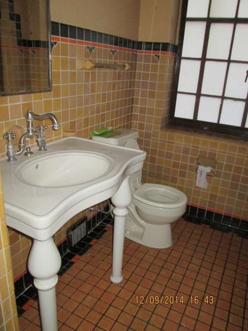 315 Selborne Road Riverside, IL 60546 - Photo 8 of 22 a bathroom with a sink and a toilet