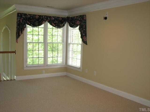 9012 Winged Thistle Court Raleigh, NC 27617 - Photo 9 of 12 The bonus room /loft has a large walk-in closet and it is open to the second floor landing so that you can enjoy panoramic views of the golf course. It is wired for sound.