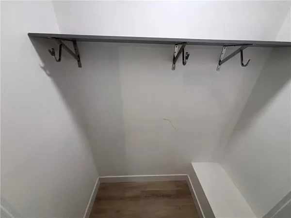 a view of small space with racks on the wall