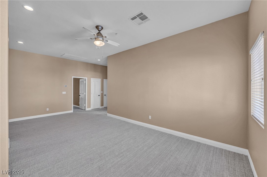 2107 Eaglepath Circle Henderson, NV 89074 - Photo 41 of 84 Loft featuring carpet floors, recessed lighting, and a ceiling fan
