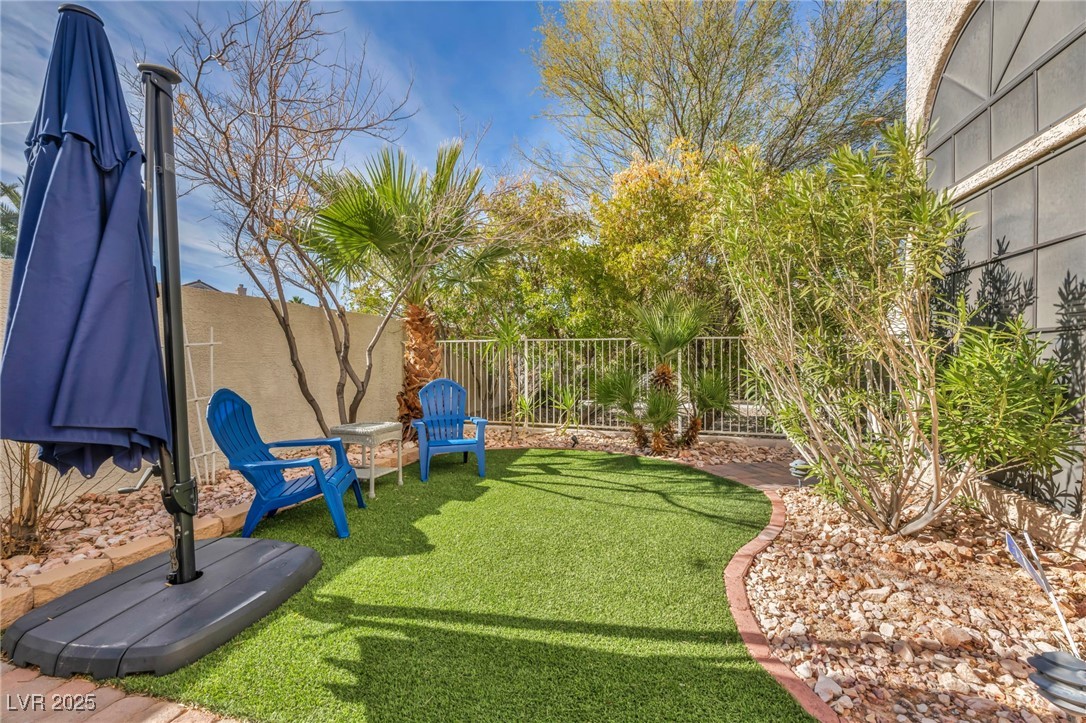 2107 Eaglepath Circle Henderson, NV 89074 - Photo 62 of 84 View of yard featuring a patio
