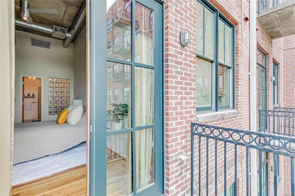 3235 Roswell Road Northeast, Unit 702 Atlanta, GA 30305 - Photo 5 of 16 a view of balcony and workspace