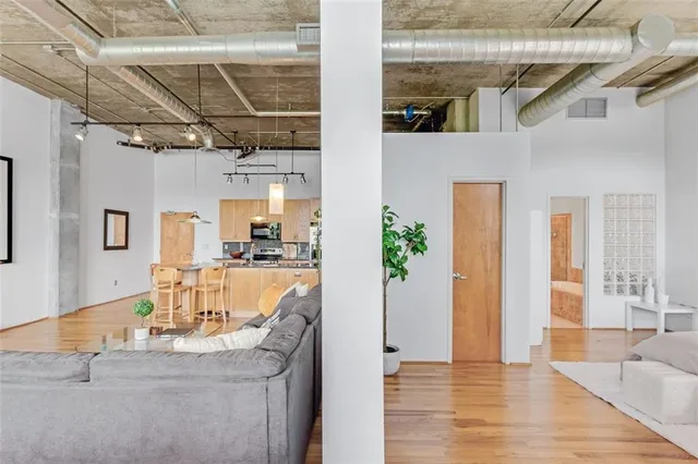 a view of a living room and entryway