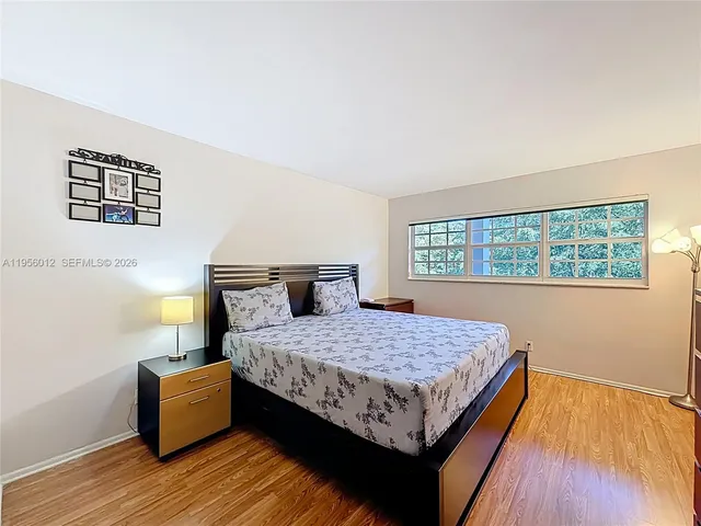 a view of a two chairs in the balcony