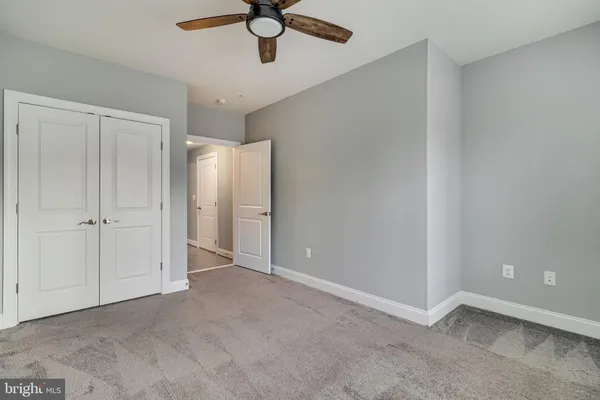 an empty room with fan