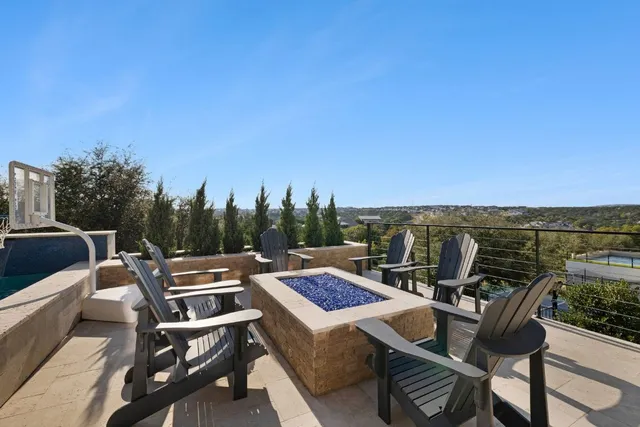 a view of a terrace with chairs