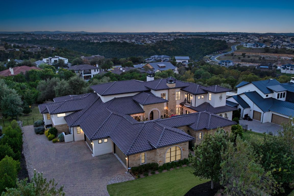 496 Primo Fiore Terrace Austin, TX 78738 - Photo 37 of 40 an aerial view of a house with a garden