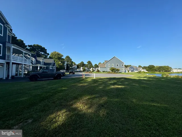 a view of a house with a big yard