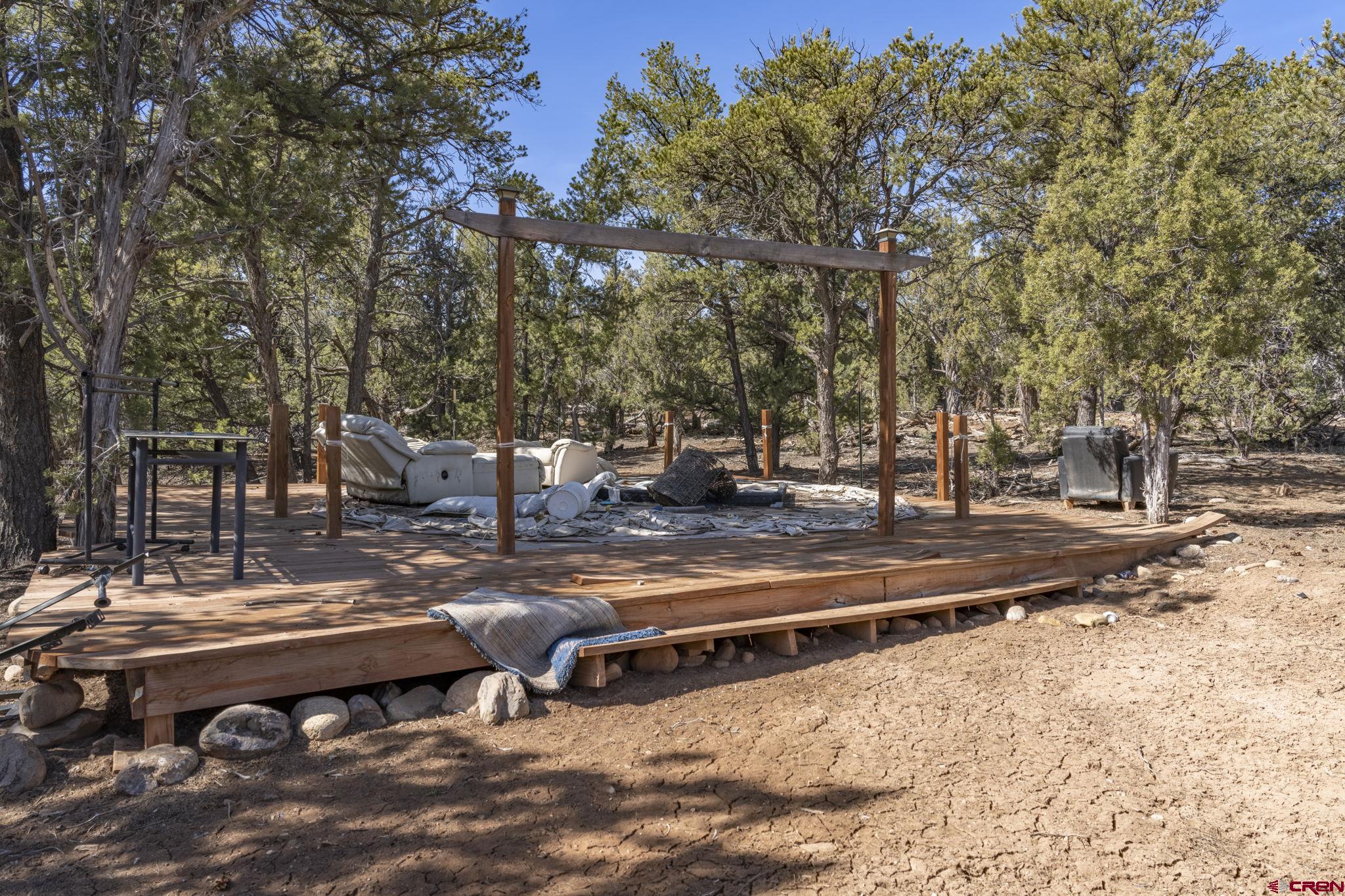 719 Rancho Durango Road Durango, CO 81303 - Photo 12 of 35 a view of a park with bench