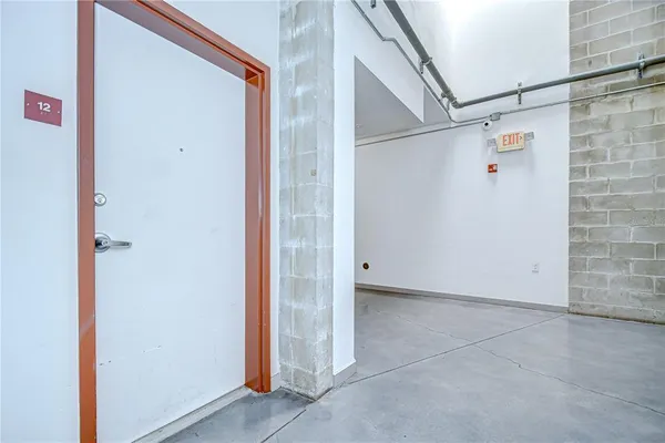 a view of empty room with stairs