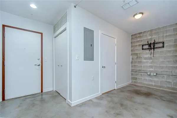 a view of a workspace with furniture