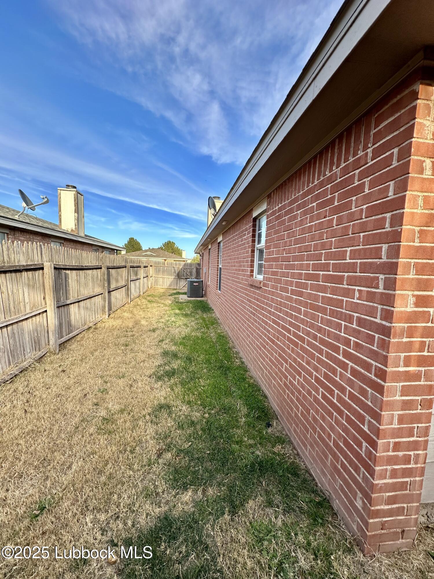 222 Grover Avenue Lubbock, TX 79416 - Photo 14 of 14 a view of backyard with hardwood