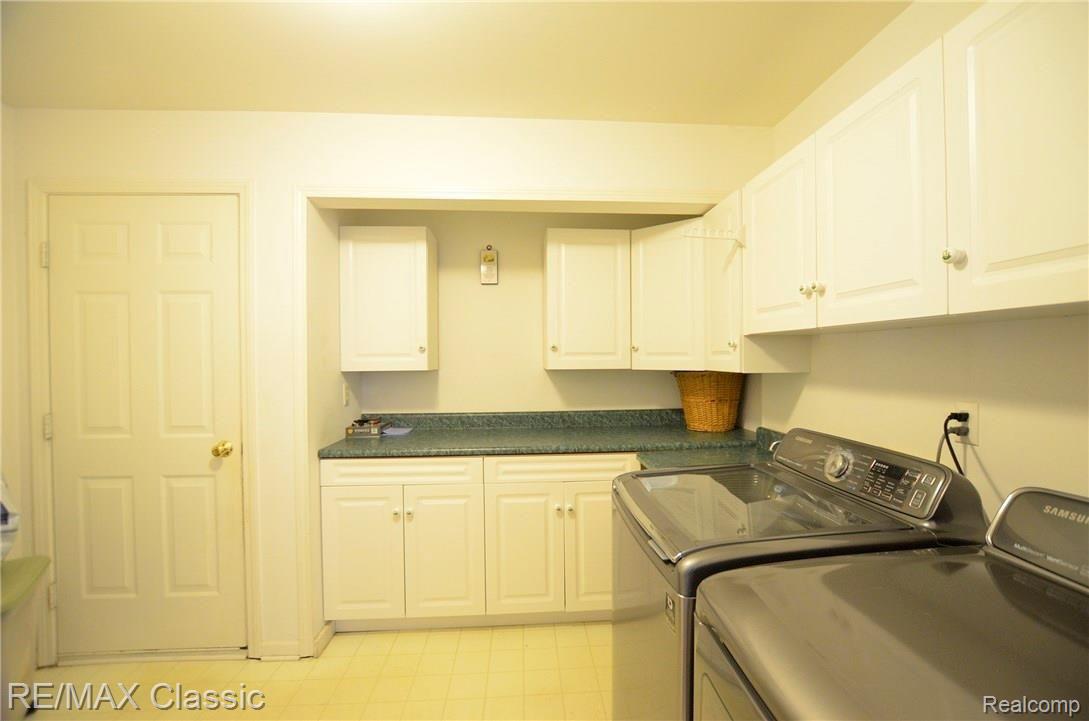 3232 Topview Court, Unit 56 Rochester, MI 48309 - Photo 20 of 27 Laundry room with lots of cabinets