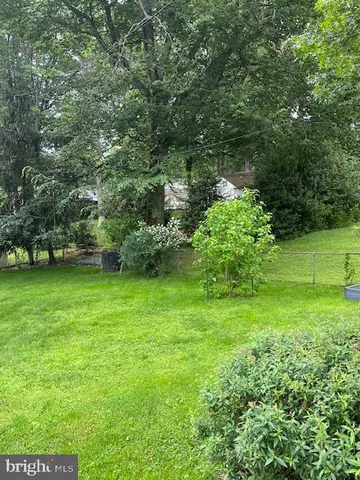 a view of a garden with a lake
