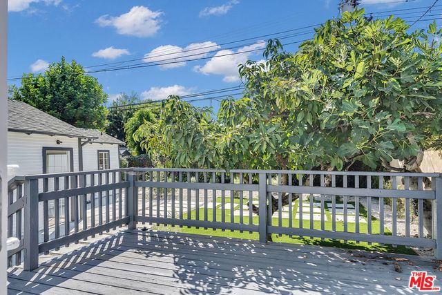 a view of a wooden roof deck