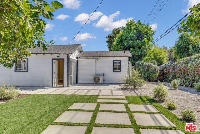 a front view of house with yard