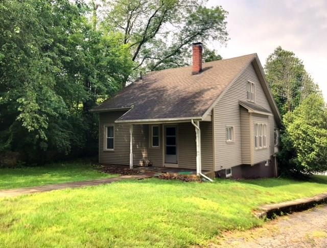958 Main Street Killingly, CT 06239 - Photo 1 of 1 front view of house with a yard