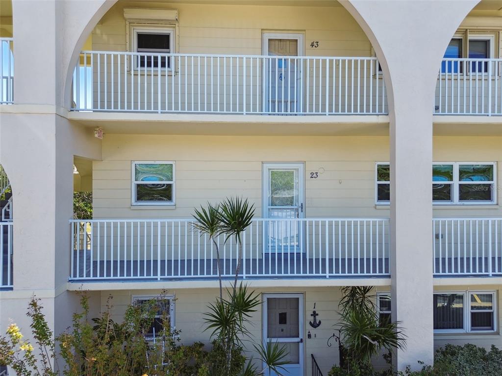2259 Costa Rican Drive, Unit 23 Clearwater, FL 33763 - Photo 1 of 1 a view of a house with balcony