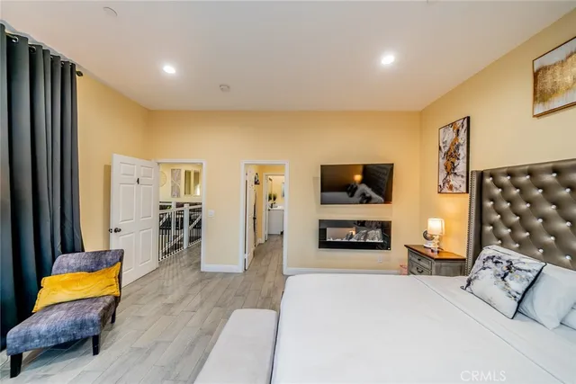 a view of an entryway with wooden floor