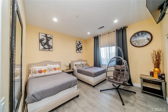 a view of a swimming pool with a table and chairs