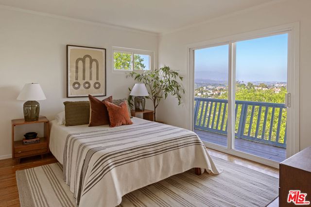 a open area with a yard and mountain view