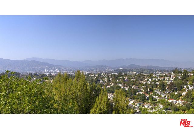 a outdoor living space with furniture and garden view