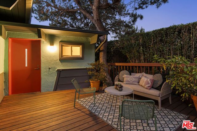 a view of a chairs on the roof deck
