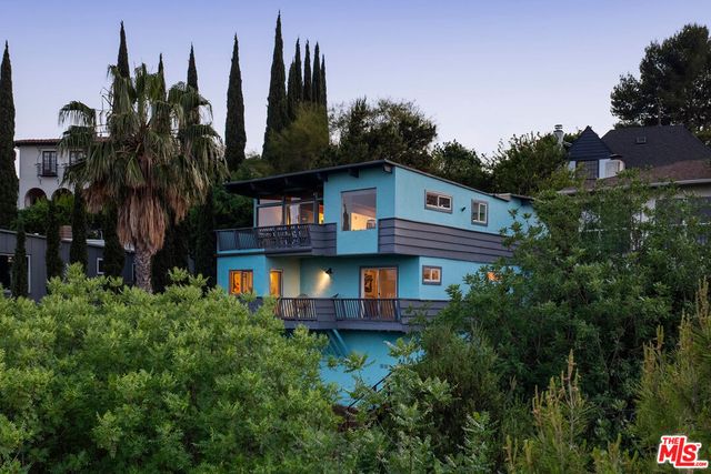 a black and white photo of a house