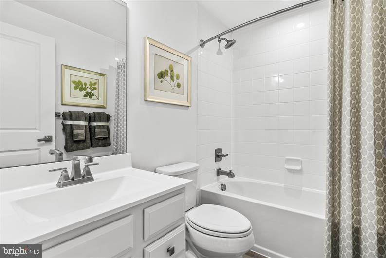 Kloman Street, Unit MOZART 4 Baltimore, MD 21230 - Photo 26 of 27 a bathroom with a sink toilet and shower