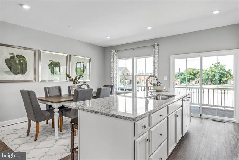 Kloman Street, Unit MOZART 4 Baltimore, MD 21230 - Photo 6 of 27 a dining hall with stainless steel appliances granite countertop a granite counter tops and a large window