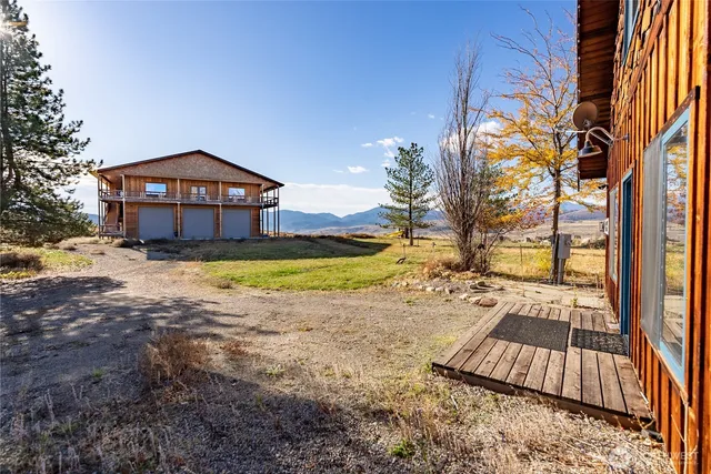 a view of a house with a mountain