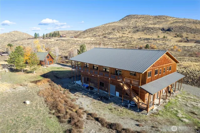 a view of a house with a mountain